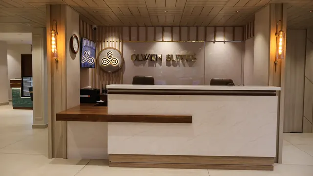 Hotel reception with wood panelling, Edappally